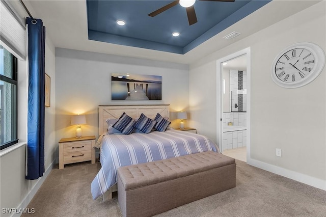 137 SE 23rd Ter, Cape Coral, FL 33990 - bedroom featuring carpet floors, baseboards, ensuite bath, visible vents, and recessed lighting