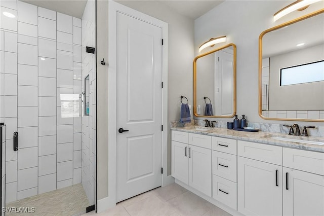 137 SE 23rd Ter, Cape Coral, FL 33990 - full bath with double vanity, tile patterned floors, tiled shower, and a sink