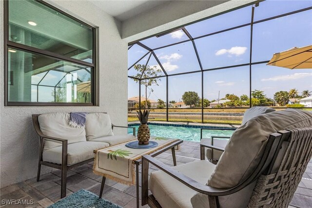 137 SE 23rd Ter, Cape Coral, FL 33990 - view of patio with a lanai, an outdoor living space, and an outdoor pool