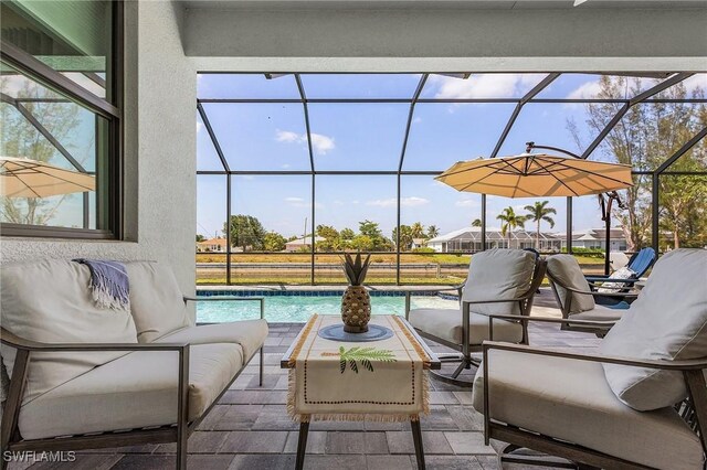 137 SE 23rd Ter, Cape Coral, FL 33990 - view of patio / terrace featuring glass enclosure, an outdoor pool, and an outdoor living space