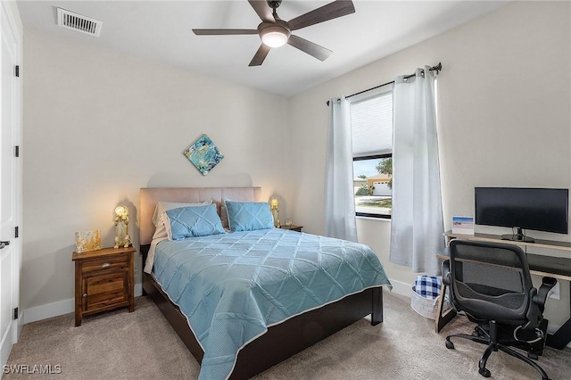 137 SE 23rd Ter, Cape Coral, FL 33990 - carpeted bedroom with baseboards, visible vents, and ceiling fan
