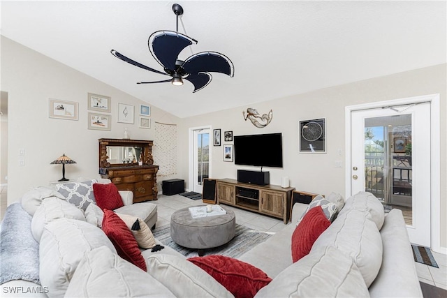 24343 Pirate Harbor Blvd, Punta Gorda, FL 33955 - living room featuring lofted ceiling, a ceiling fan, and light tile patterned floors