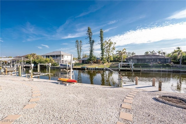 24343 Pirate Harbor Blvd, Punta Gorda, FL 33955 - view of dock featuring a residential view, a water view, and boat lift