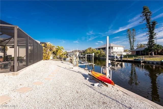 24343 Pirate Harbor Blvd, Punta Gorda, FL 33955 - dock area with a lanai, boat lift, and a water view
