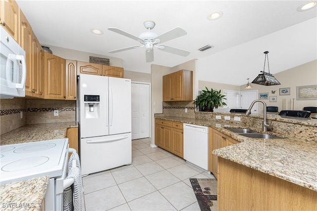 24343 Pirate Harbor Blvd, Punta Gorda, FL 33955 - kitchen featuring visible vents, a ceiling fan, a sink, white appliances, and decorative backsplash