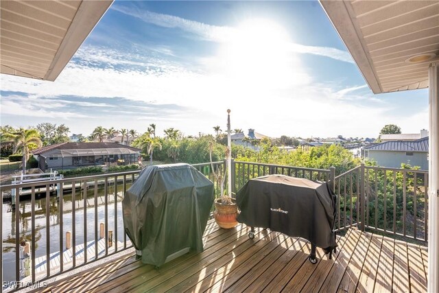 24343 Pirate Harbor Blvd, Punta Gorda, FL 33955 - wooden deck with grilling area and a water view