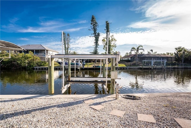 24343 Pirate Harbor Blvd, Punta Gorda, FL 33955 - view of dock featuring boat lift and a water view