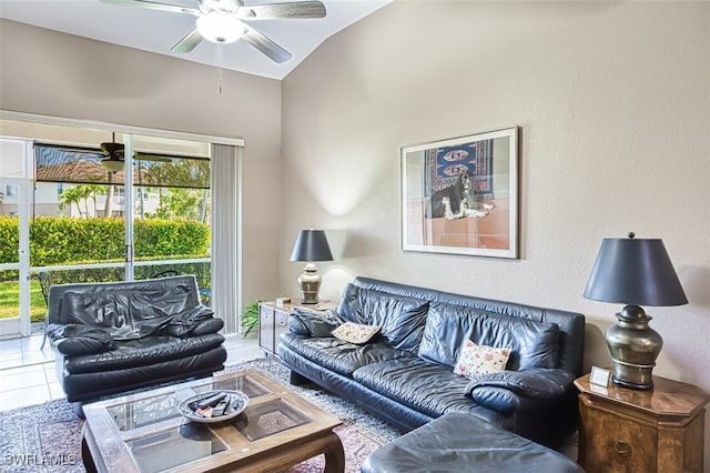 living area featuring vaulted ceiling and a ceiling fan