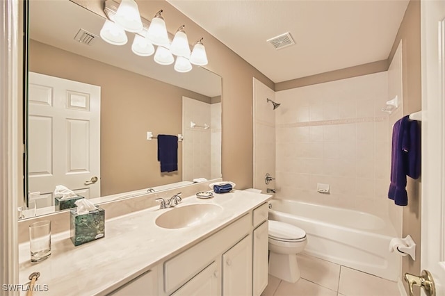 bathroom featuring toilet, tile patterned flooring, vanity, and visible vents