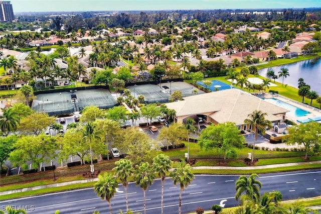drone / aerial view featuring a water view and a residential view
