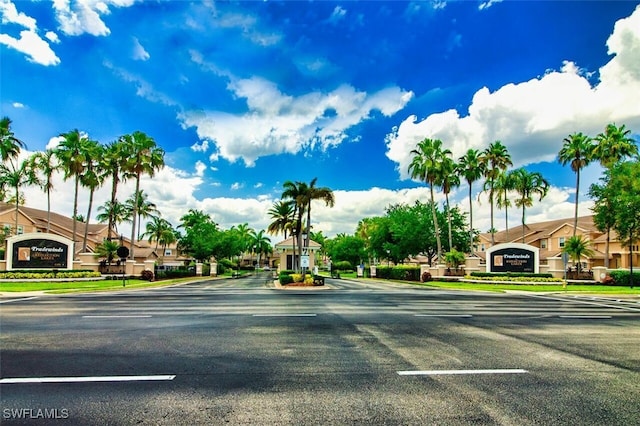 view of road featuring curbs and sidewalks