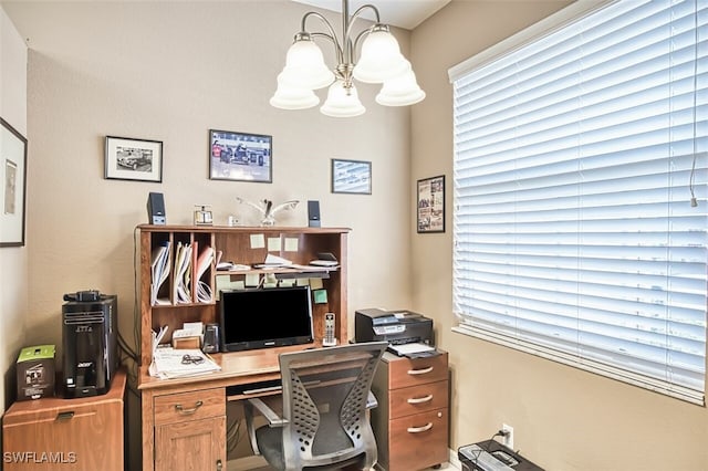 home office with a chandelier