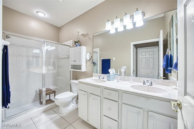 full bathroom with a shower stall, tile patterned flooring, and a sink
