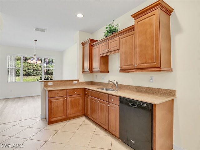 20298 Larino Loop, Estero, FL 33928 - kitchen with dishwasher, a sink, light countertops, a peninsula, and a chandelier