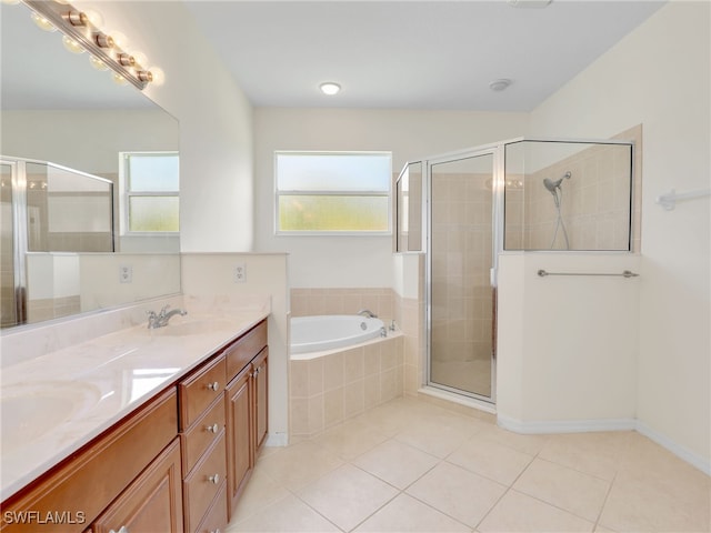 20298 Larino Loop, Estero, FL 33928 - bathroom with tile patterned floors, a shower stall, a bath, and double vanity