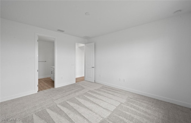 42729 Valley Brooks St, Punta Gorda, FL 33982 - unfurnished bedroom featuring carpet floors and baseboards