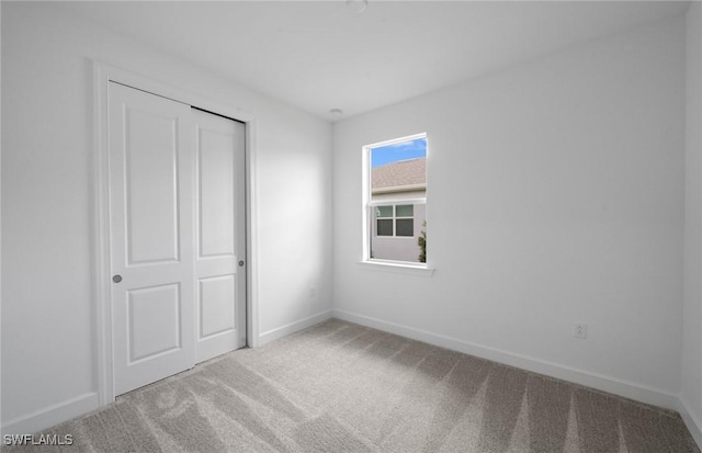 42729 Valley Brooks St, Punta Gorda, FL 33982 - unfurnished bedroom with carpet floors and a closet