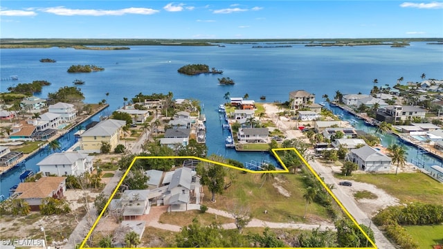 175 Bahia Via, Fort Myers Beach, FL 33931 - aerial view of residential area with property boundaries highlighted and a nearby body of water