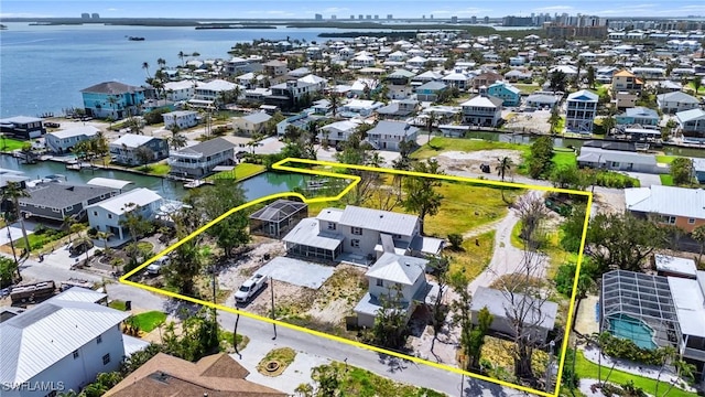 175 Bahia Via, Fort Myers Beach, FL 33931 - aerial view of residential area featuring property parcel outlined and a nearby body of water