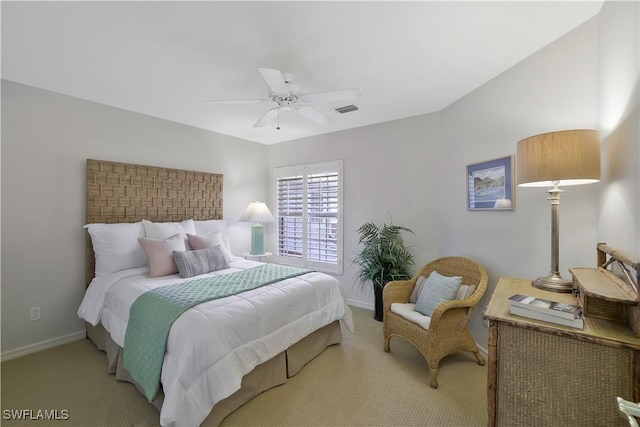 bedroom featuring baseboards, a ceiling fan, visible vents, and carpet flooring