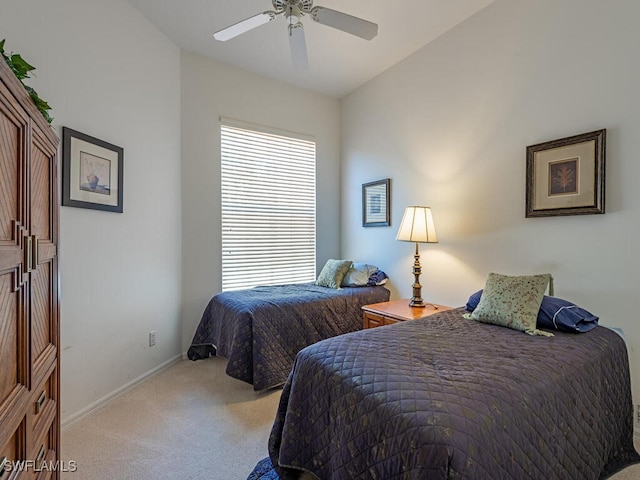1036 Egrets Walk Cir Unit 202, Naples, FL 34108 - bedroom featuring a ceiling fan, baseboards, and carpet