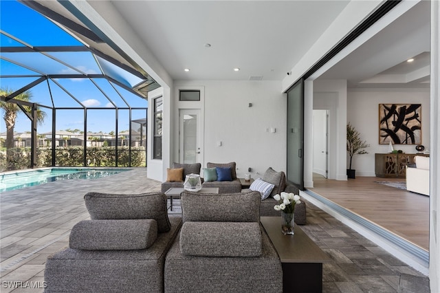 16214 Verilyn Cir, Naples, FL 34110 - view of patio / terrace featuring an outdoor living space, an outdoor pool, and glass enclosure