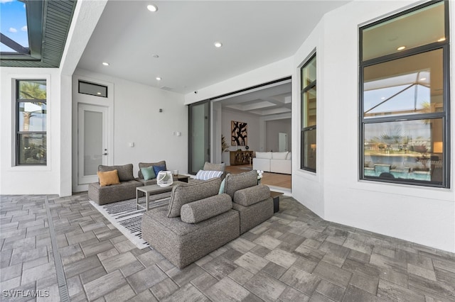 16214 Verilyn Cir, Naples, FL 34110 - view of patio with an outdoor living space