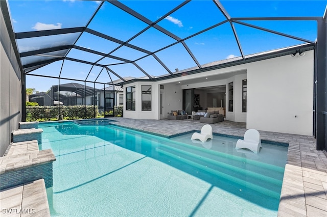 16214 Verilyn Cir, Naples, FL 34110 - outdoor pool featuring an outdoor hangout area, glass enclosure, and a patio
