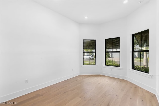 16214 Verilyn Cir, Naples, FL 34110 - empty room featuring light wood-type flooring, baseboards, and recessed lighting