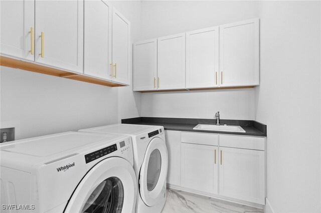 16214 Verilyn Cir, Naples, FL 34110 - laundry room with marble finish floor, cabinet space, washer and dryer, and a sink