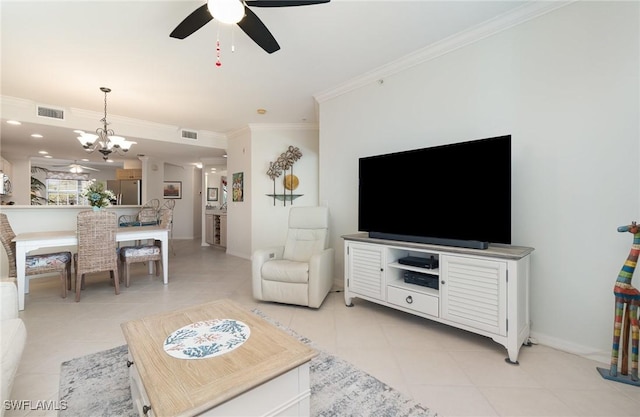 living room featuring baseboards, ornamental molding, ceiling fan with notable chandelier, and light tile patterned flooring