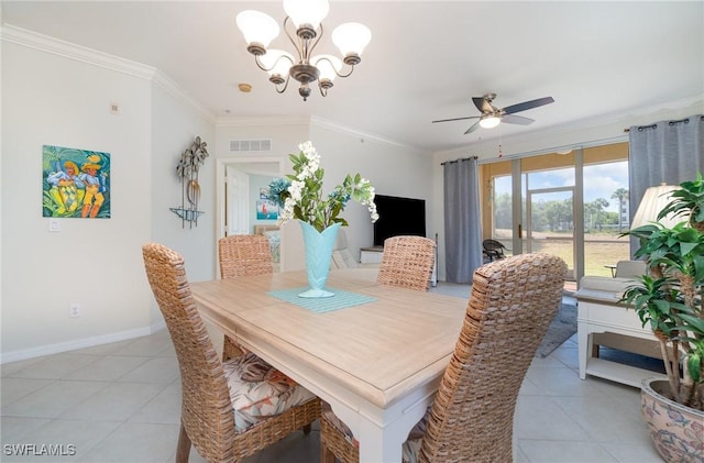 dining room featuring crown molding, light tile patterned flooring, ceiling fan with notable chandelier, baseboards, and visible vents
