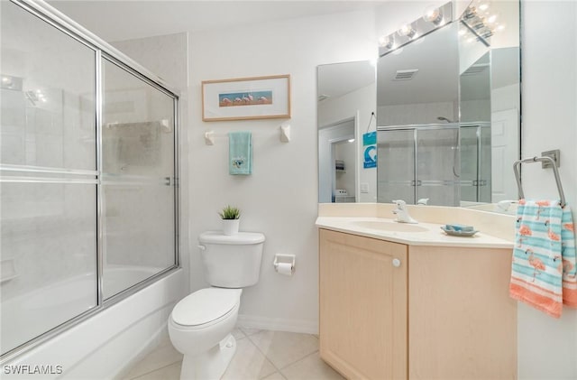 full bath featuring visible vents, tile patterned floors, bath / shower combo with glass door, vanity, and toilet