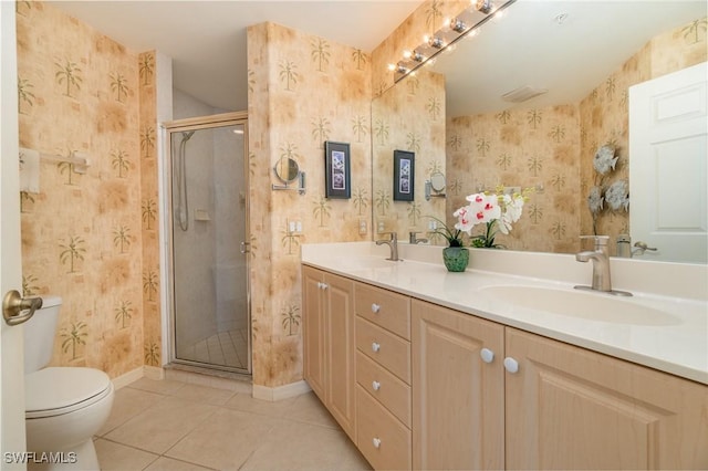 full bath featuring a sink, toilet, tile patterned floors, wallpapered walls, and a stall shower