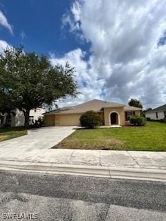 18301 Pine Nut Ct, Lehigh Acres, FL 33972 - view of front of home featuring an attached garage, a front yard, and concrete driveway