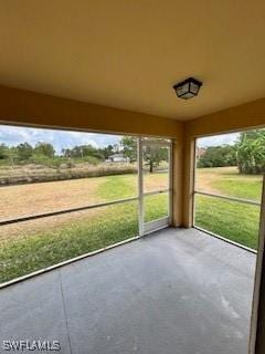 18301 Pine Nut Ct, Lehigh Acres, FL 33972 - view of unfurnished sunroom