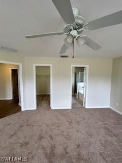 18301 Pine Nut Ct, Lehigh Acres, FL 33972 - unfurnished bedroom featuring baseboards, carpet flooring, a ceiling fan, and a spacious closet
