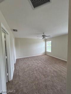 18301 Pine Nut Ct, Lehigh Acres, FL 33972 - carpeted empty room featuring baseboards, ceiling fan, and visible vents