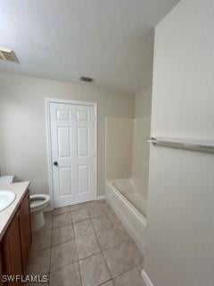 18301 Pine Nut Ct, Lehigh Acres, FL 33972 - bathroom featuring vanity, tile patterned flooring, visible vents, a shower, and toilet