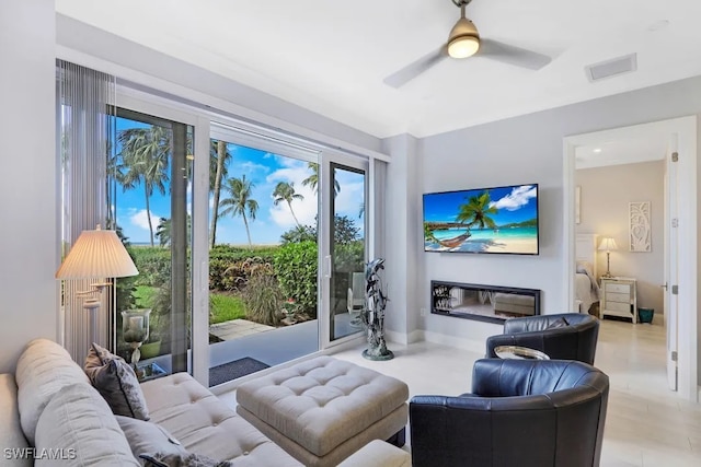 140 Seaview Ct Unit 103N, Marco Island, FL 34145 - living room with ceiling fan and visible vents