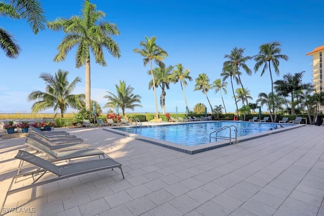 140 Seaview Ct Unit 103N, Marco Island, FL 34145 - pool featuring a patio area