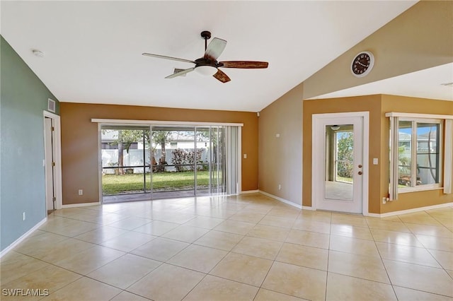 unfurnished room featuring ceiling fan, visible vents, baseboards, lofted ceiling, and light tile patterned flooring