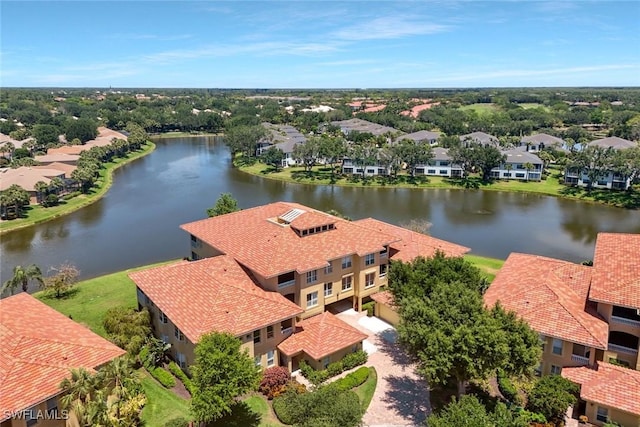 bird's eye view with a residential view and a water view