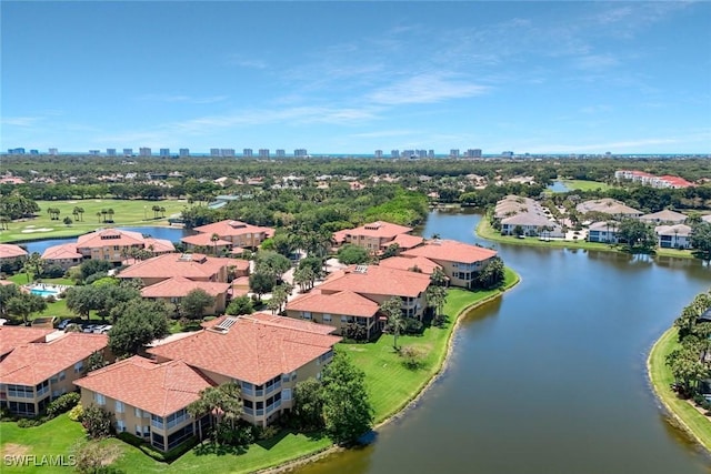 bird's eye view with a view of city and a water view