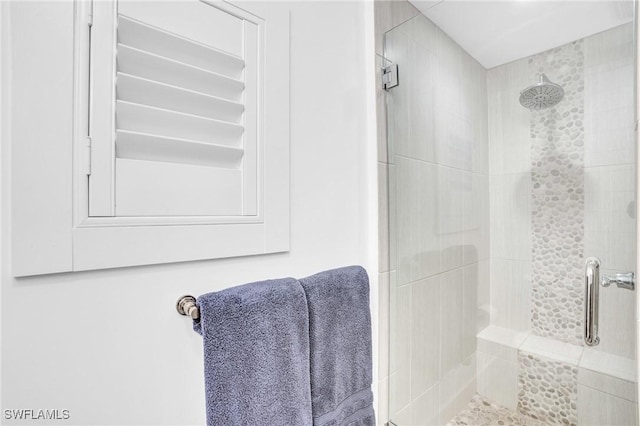 bathroom featuring a stall shower