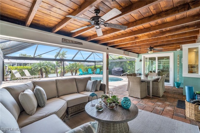 exterior space with a lanai, ceiling fan, an outdoor hangout area, outdoor dining space, and an outdoor pool