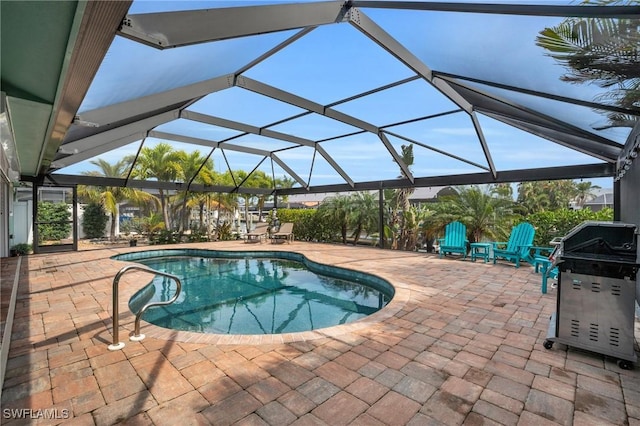 pool featuring a patio area and a lanai
