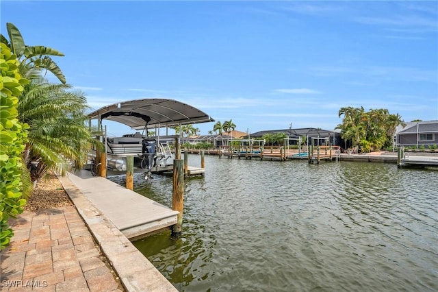 view of dock with a water view and boat lift