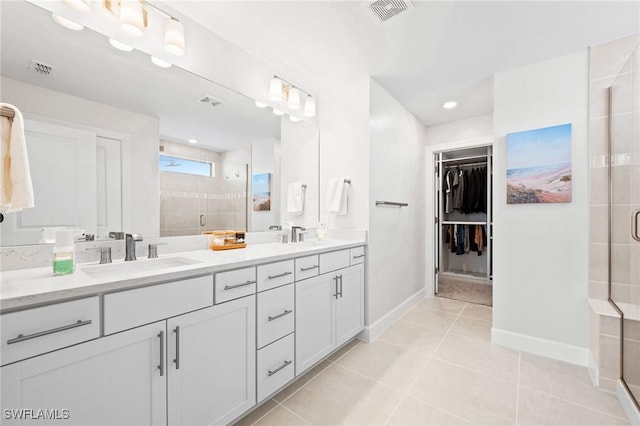 20250 Napa Loop, Estero, FL 33928 - full bath featuring double vanity, visible vents, a stall shower, and a sink