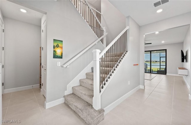 20250 Napa Loop, Estero, FL 33928 - stairs with recessed lighting, visible vents, tile patterned floors, and baseboards
